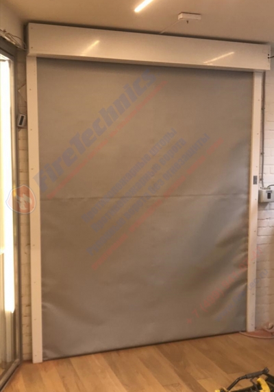 Рулонные противопожарные ворота (шторы) торговой марки "FireTechnics" модели "FireTechnics-EI60", с полотном из негорючих материалов. Предел огнестойкости EI60 (без орошения), опущены